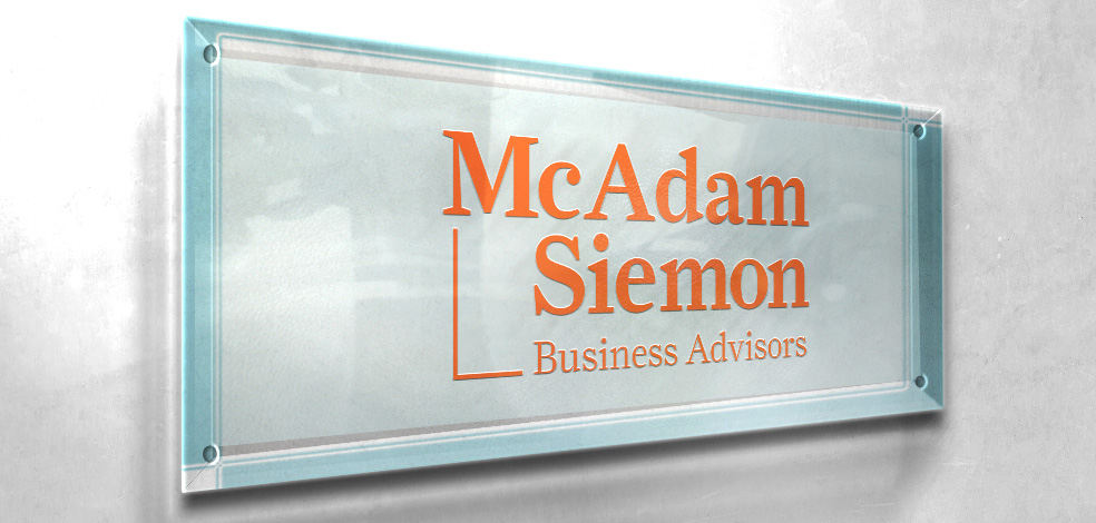 McAdam Siemon Business Advisors sign on wall